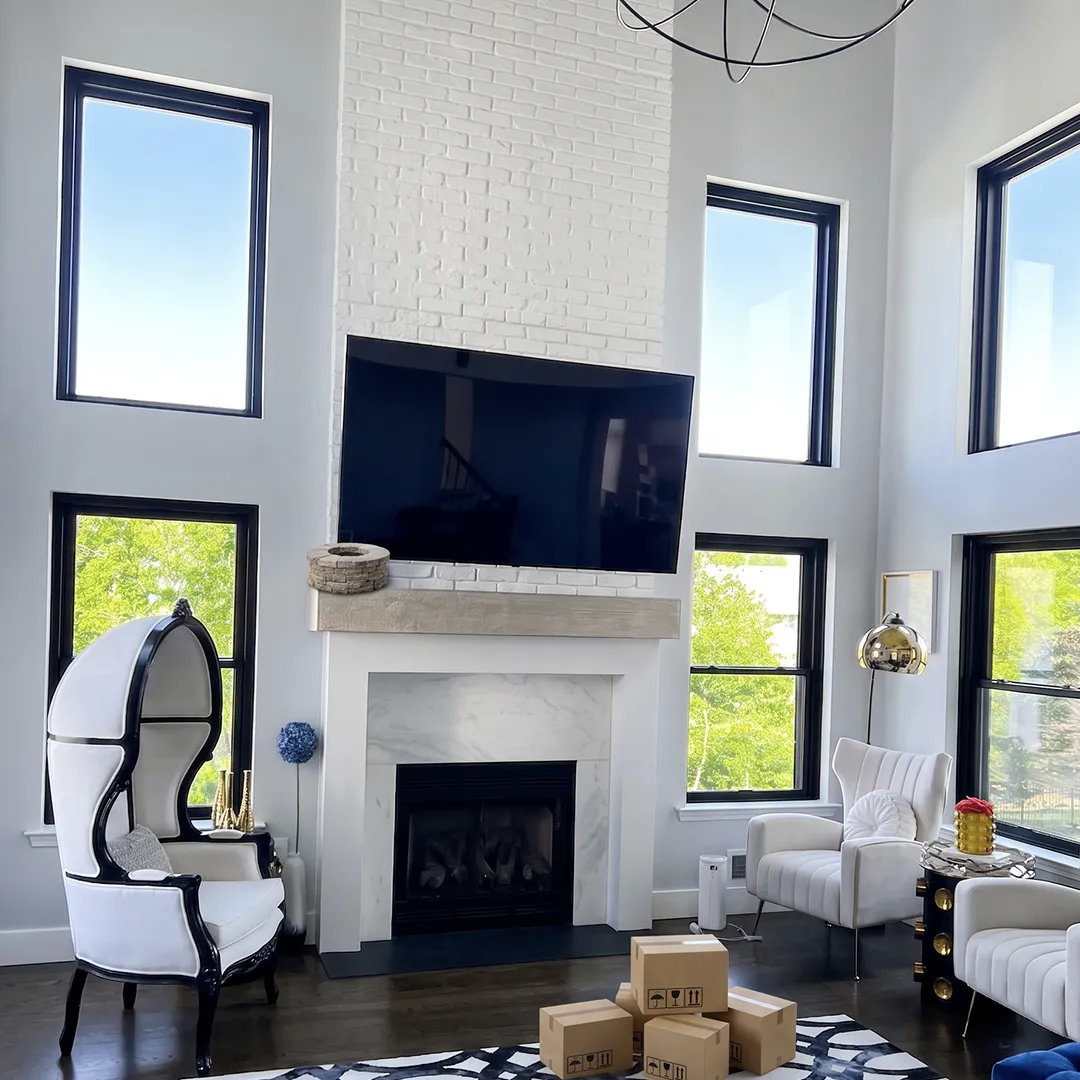 Living room after new black-framed windows were installed