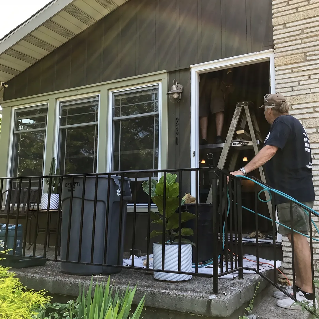 Front entry enclosure before window and door replacement