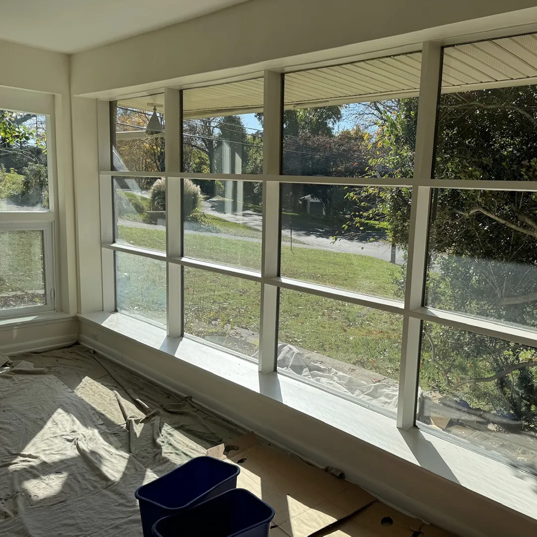 Sunroom before replacing the wide window wall