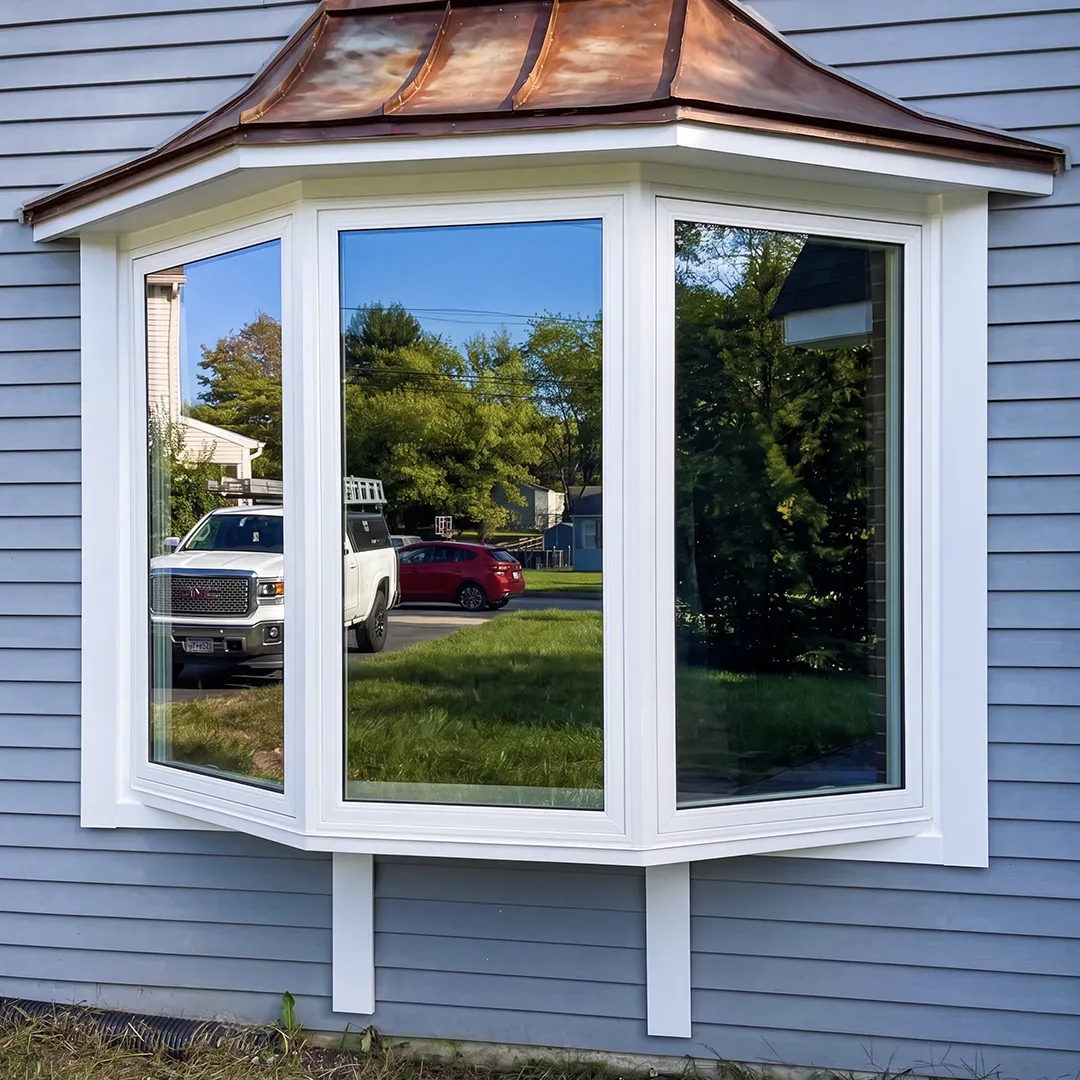Bay window after installing white energy-efficient window units