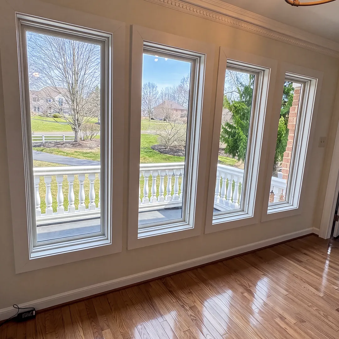 Dining room window set after installing white replacement windows