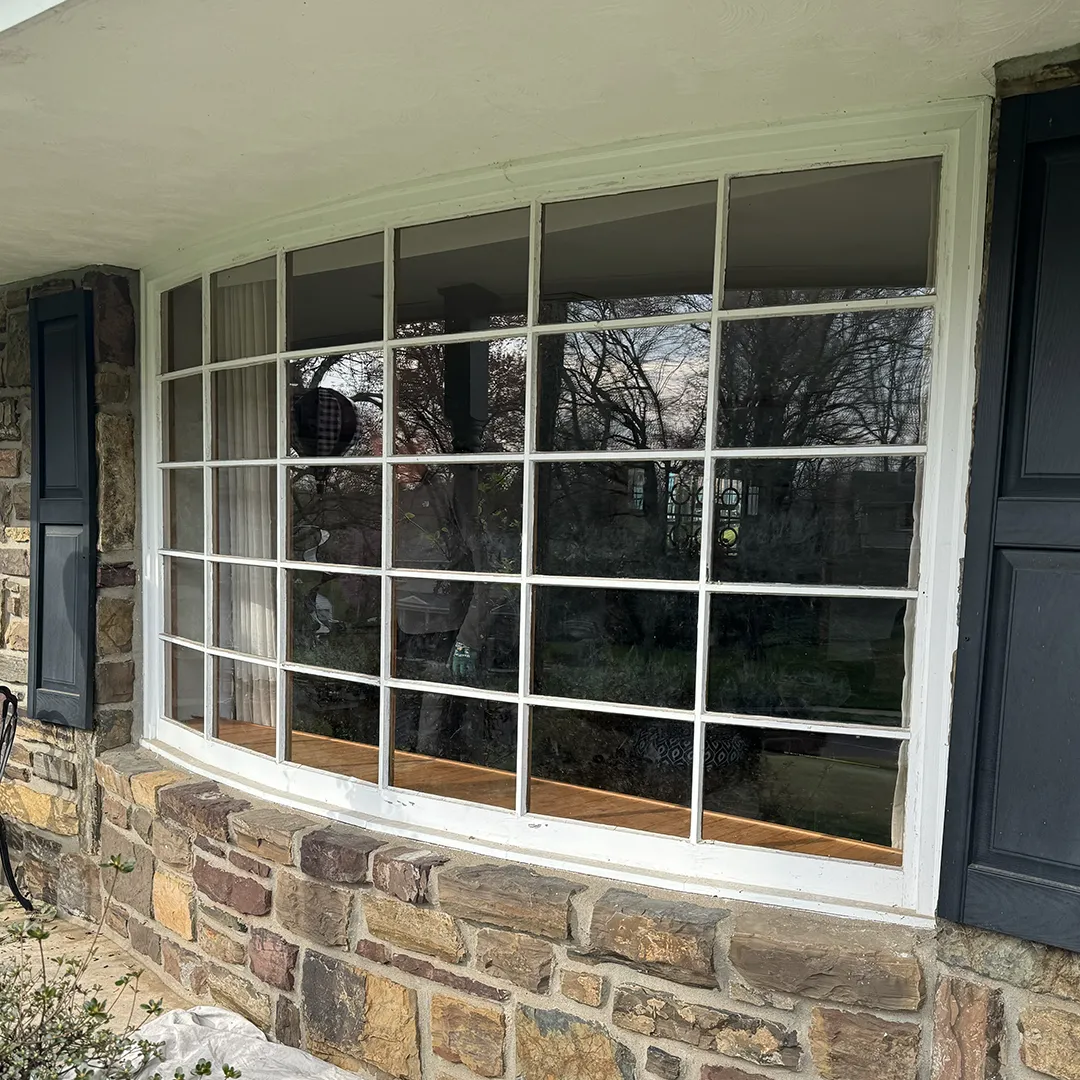 Stone facade window group before replacement