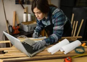 A girl doing a research for a door replacement online