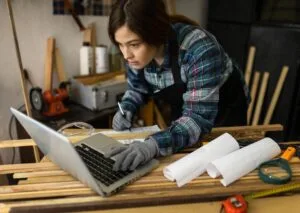 A girl doing a research for a door replacement online