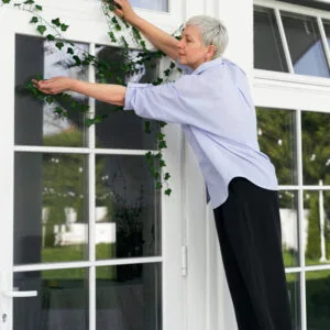A lady decorating her window