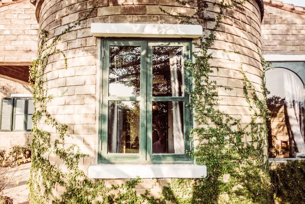 A window in a sturdy house