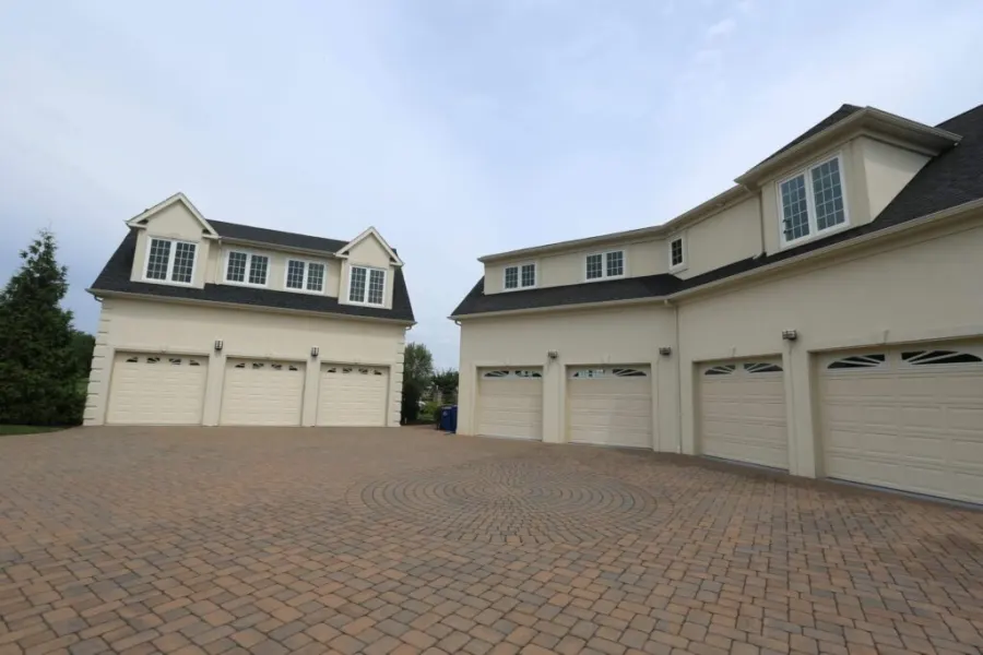 Home exterior and detached garages with replacement windows