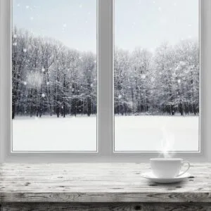 Winter home exterior with replacement window planning