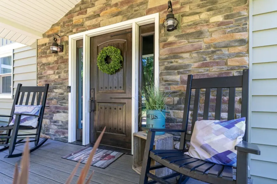 Woodgrain ProVia entry door with decorative glass