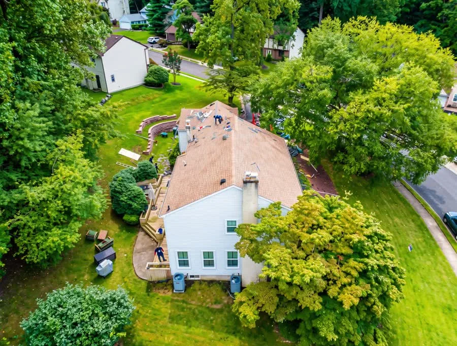 Aerial view of a roof replacement in progress