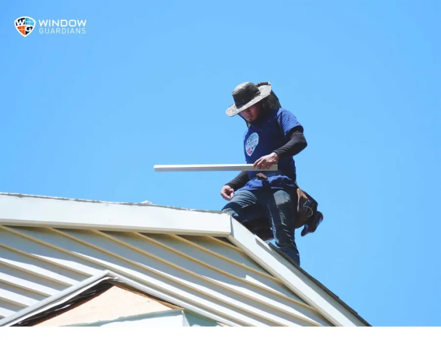 Roofing team working on a home exterior