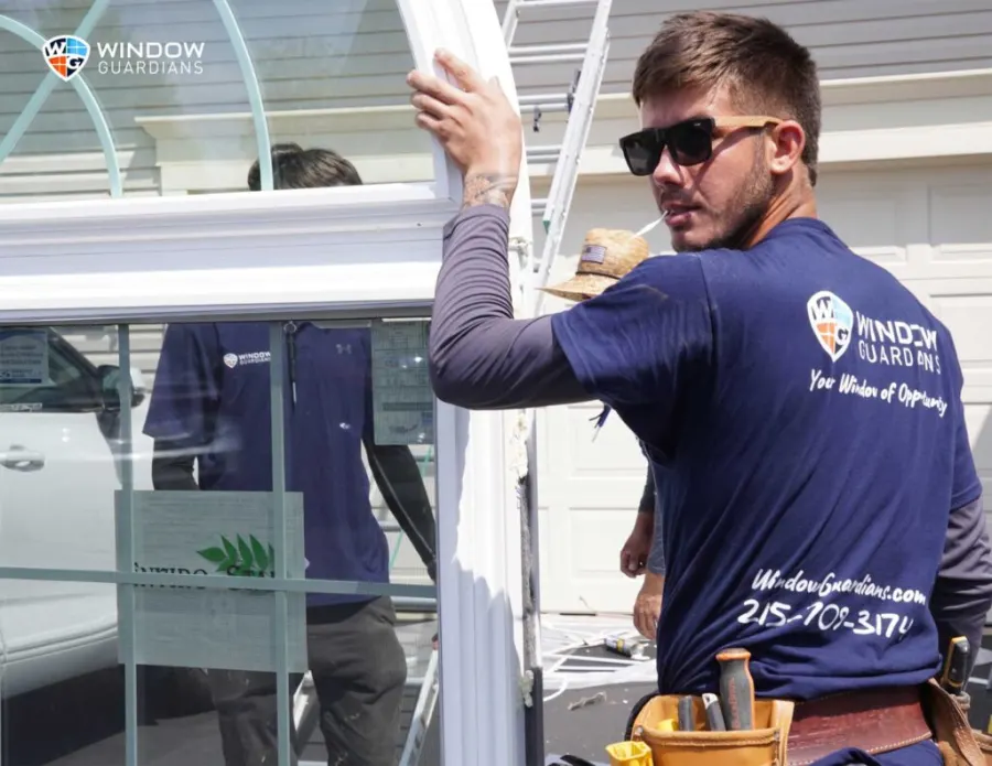 Window installation team working at a home