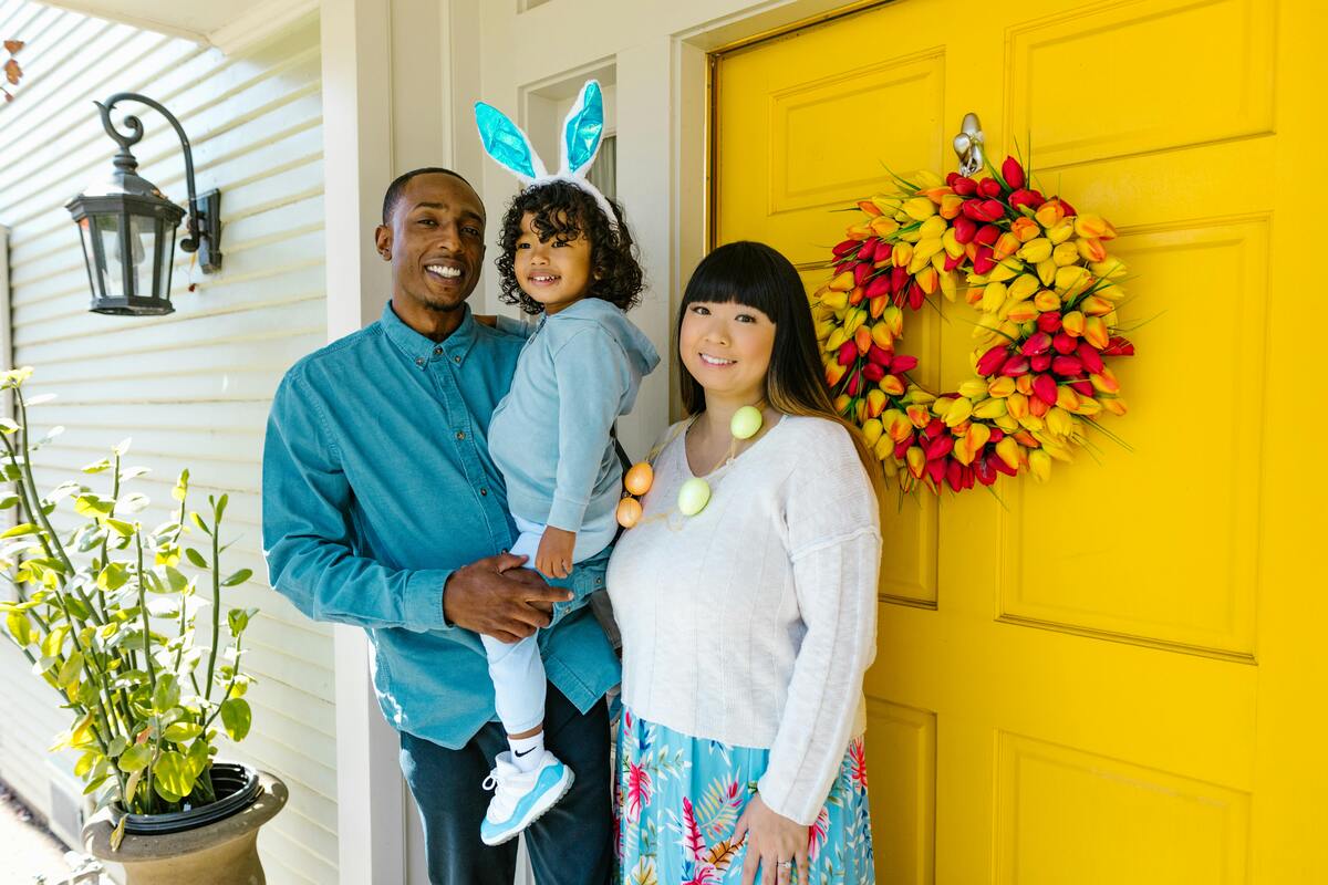 A happy family at the front door